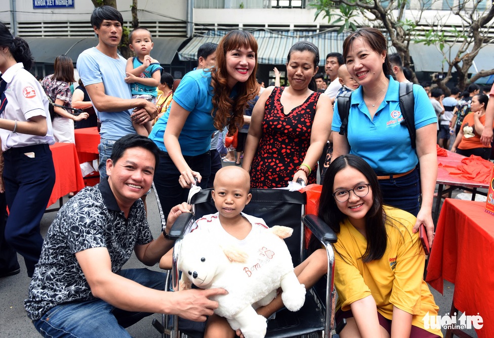 Hình ảnh nhân viên Cty in Minh Mẫn san sẻ Xuân yêu thương